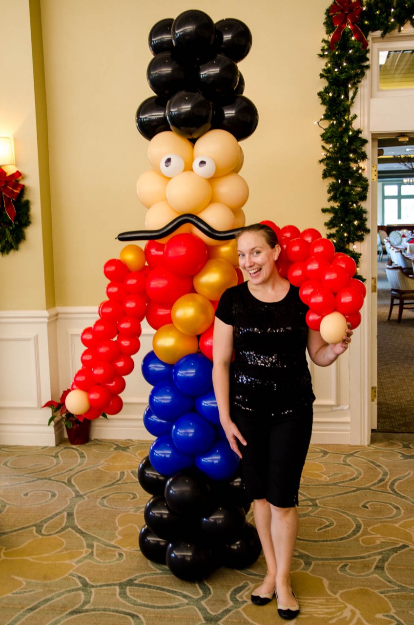 Over 7.5 feet tall, balloon column nutcracker.